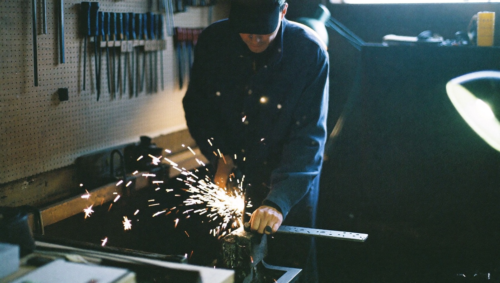 A fabricator at work in their own workshop